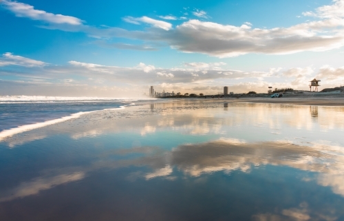 Reflections on the beach at the Gold Coast. - Australian Stock Image