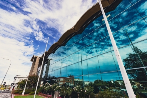 Reflective windows of the Bathurst Regional Council War Memorial Civic Centre - Australian Stock Image