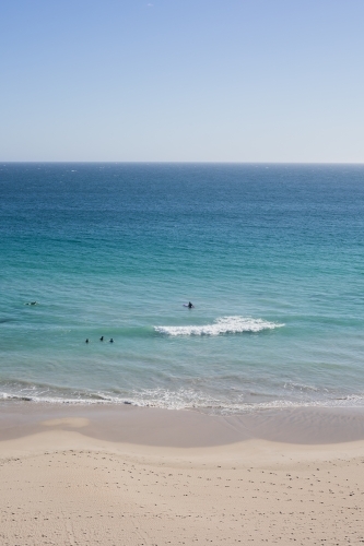 Remote beach swimmers - Australian Stock Image