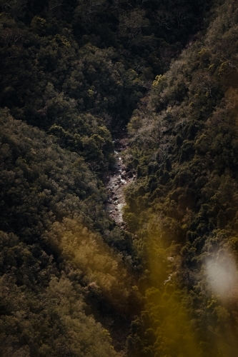 Remote river at the bottom of a valley at Kanangra Walls Lookout, NSW - Australian Stock Image