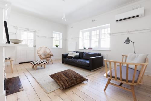 Renovated old and spacious apartment with beautiful Scandi contemporary styling - Australian Stock Image