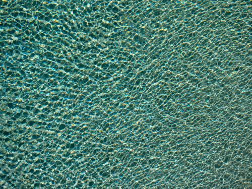 Rippled water pattern on a swimming pool