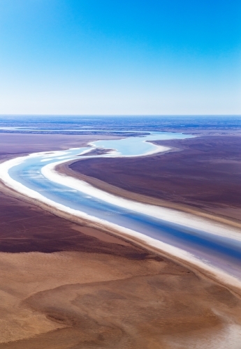 river snaking through brown landscape - Australian Stock Image