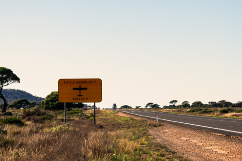 Road Airstrip landing sign on side of road, Eyre Highway, Western Australia - Australian Stock Image