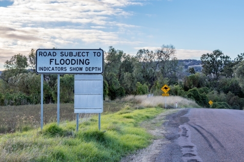 Road subject to flooding sign - Australian Stock Image