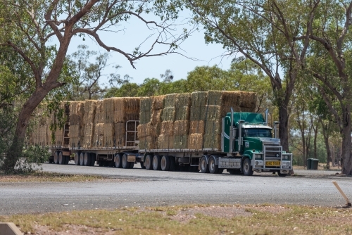 Road train with hay - Australian Stock Image
