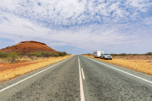 Road trip through the Pilbara, Western Australia with 4wd and caravan. - Australian Stock Image