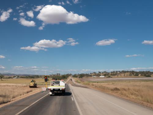 Road works with a vehicle at the stop signals - Australian Stock Image