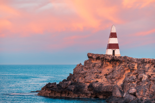 Robe Obelisk at sunrise viewed from the walking trail - Australian Stock Image