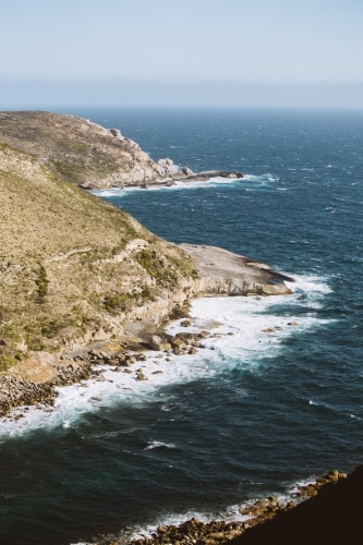 Rock formation next to ocean - Australian Stock Image