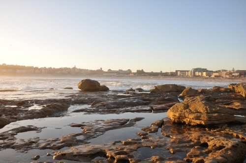 Rocks near beach at sunset - Australian Stock Image