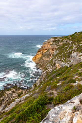 Rocky Cliffs and Crashing Waves near Remarkable Rocks, Kangaroo Island - Australian Stock Image