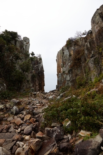 Rocky coastal landscape on overcast day - Australian Stock Image