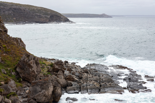 Rocky Coastline and Crashing Waves at Admirals Arch, Kangaroo Island - Australian Stock Image