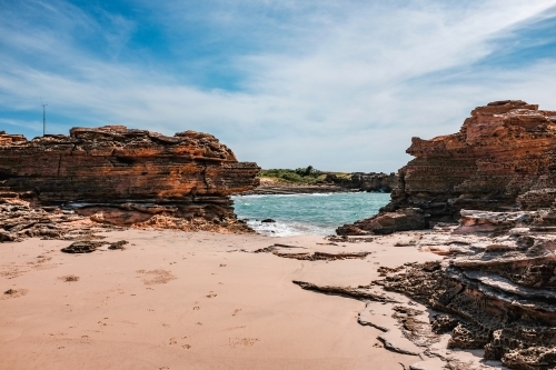 Rocky coastline with ocean and blue sky - Australian Stock Image