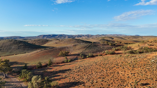 Rolling outback ranges with blue skies - Australian Stock Image