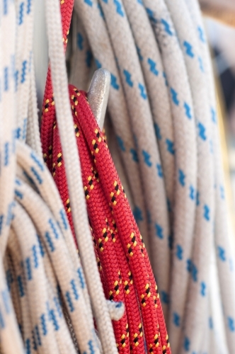 Rope wound around a hook on a sailing boat - Australian Stock Image