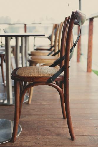 Row of chairs at a restaurant - Australian Stock Image