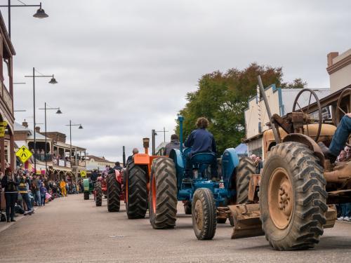 Row of tractors in a street parade - Australian Stock Image