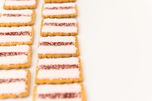 Rows of iced vovo biscuits - Australian Stock Image