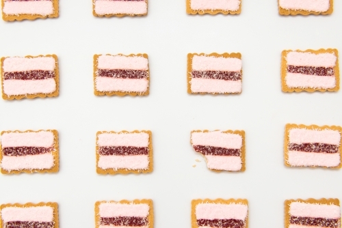 Rows of iced vovo biscuits - Australian Stock Image