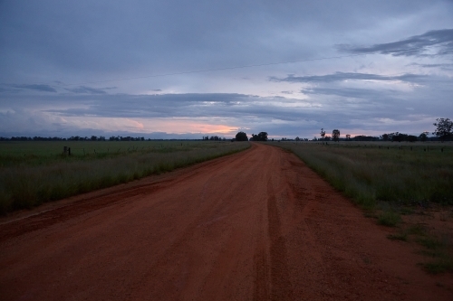 Rural road and landscape on sunset - Australian Stock Image