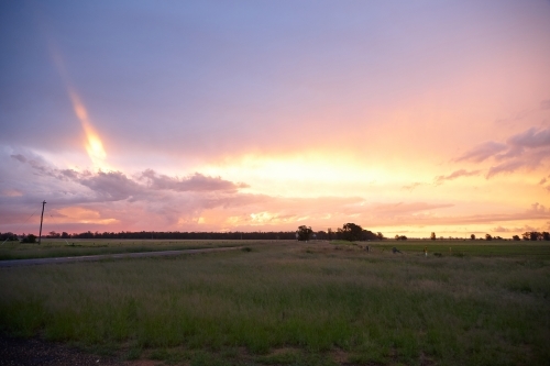 Rural roadside and landscape on sunset - Australian Stock Image