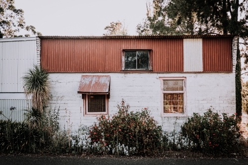 Rustic Country Stone Cottage with garden - Australian Stock Image