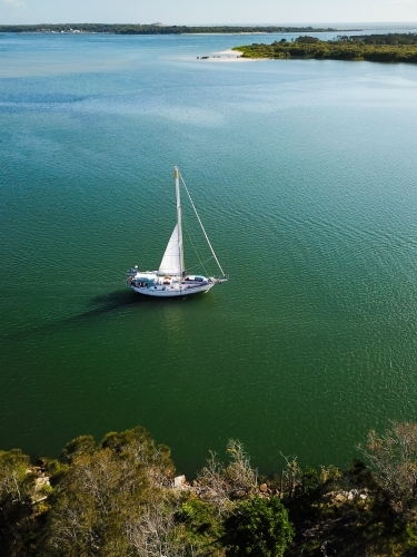 Sail boat on the Clarence River near Yamba - Australian Stock Image