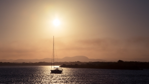 Sailboat at sunset - Australian Stock Image