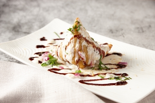 Samosa dish on table - Australian Stock Image