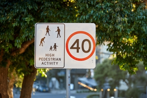 School zone sign on leafy street - Australian Stock Image