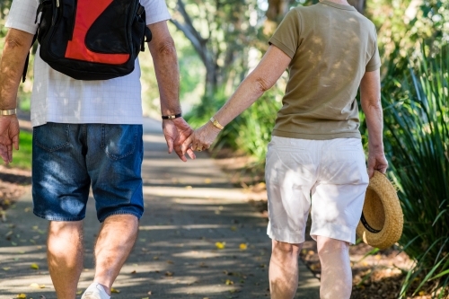senior couple on a walk together - Australian Stock Image