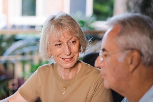 senior couple talking, close up - Australian Stock Image