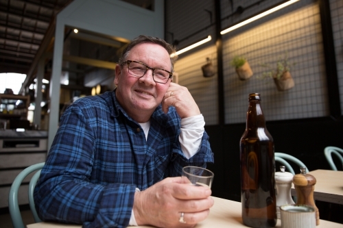 Senior Man in Coffee Shop - Australian Stock Image
