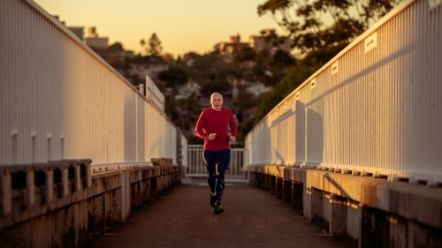 Senior Mature Runner in the morning - Australian Stock Image