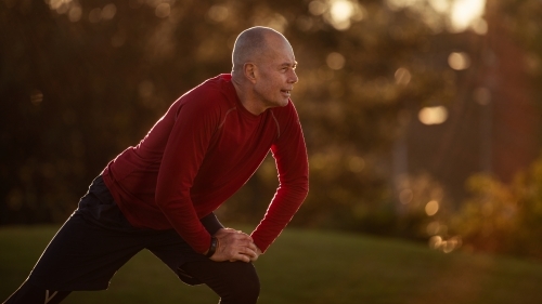 Senior Mature Runner in the morning - Australian Stock Image