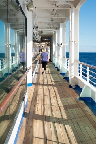 senior woman on a cruise vacation - Australian Stock Image