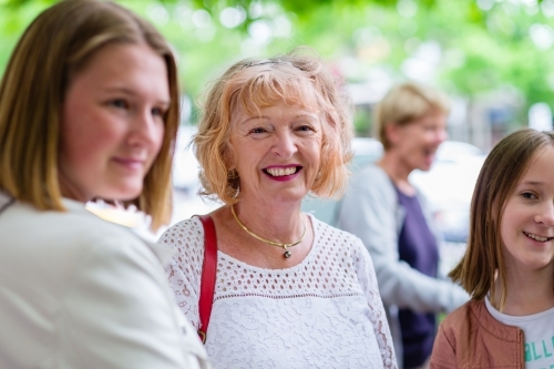 senior woman out with her granddaughters - Australian Stock Image