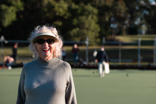 Seniors Playing Lawn Bowls Outdoors - Australian Stock Image