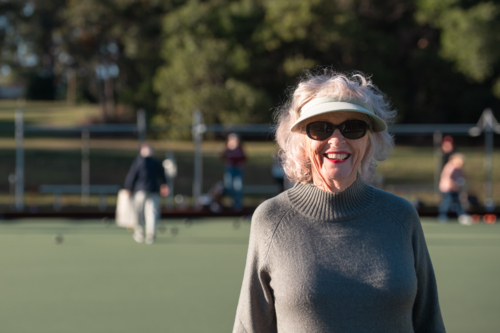 Seniors Playing Lawn Bowls Outdoors - Australian Stock Image