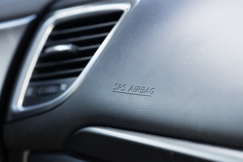 shallow depth of field of a car dashboard with focus on the word air in SRS airbag - Australian Stock Image