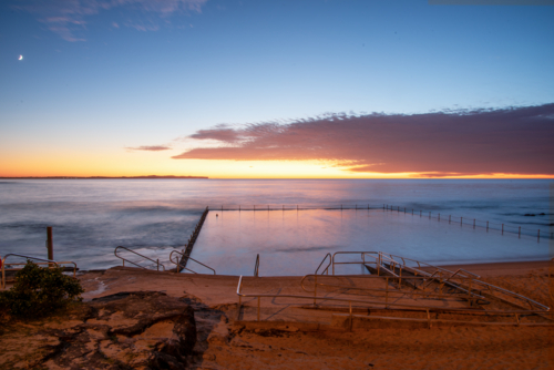 Shelly Park ocean pool at sunrise - Australian Stock Image