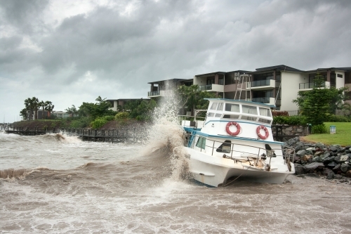 Shipwreck on rocks during Cyclone Yasi