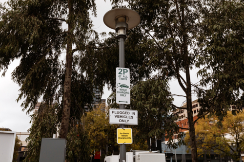 Signage at electric vehicle car park in the city - Australian Stock Image