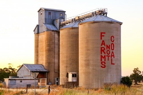 Silos painted with Farms not Coal in rural NSW.