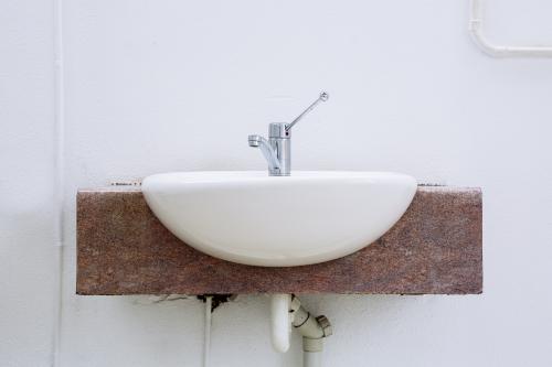 Sink in an outdoor public toilet - Australian Stock Image