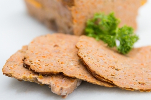 Sliced meatloaf in butchers shop - Australian Stock Image