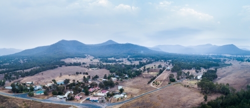 Small town of Bulga covered in smoke haze from backburning - Australian Stock Image
