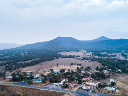 Small town of Bulga covered in smoke haze from backburning - Australian Stock Image